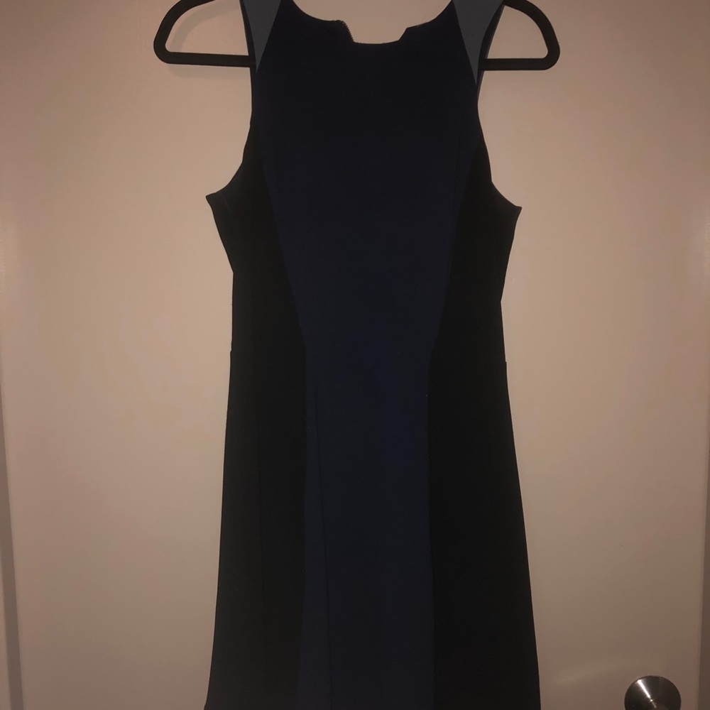 Navy, grey, and black knee length dress